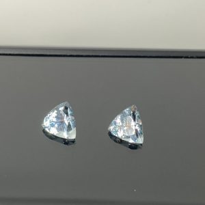 Set of 2 trilliant cut pale blue aquamarines